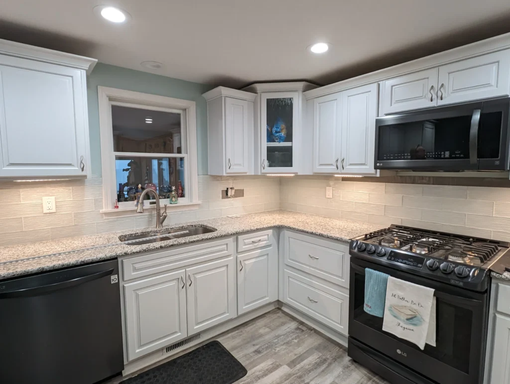 Kitchen With Glass Tile Backsplash - Conneaut, OH